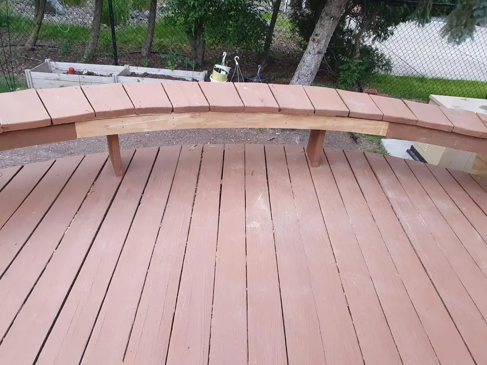 Curved bench built into a new deck in Buffalo NY