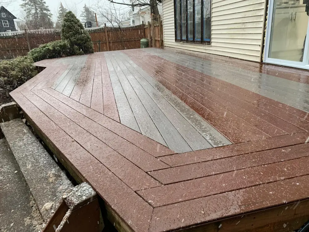 Freshly stained deck with a picture frame border in Buffalo NY